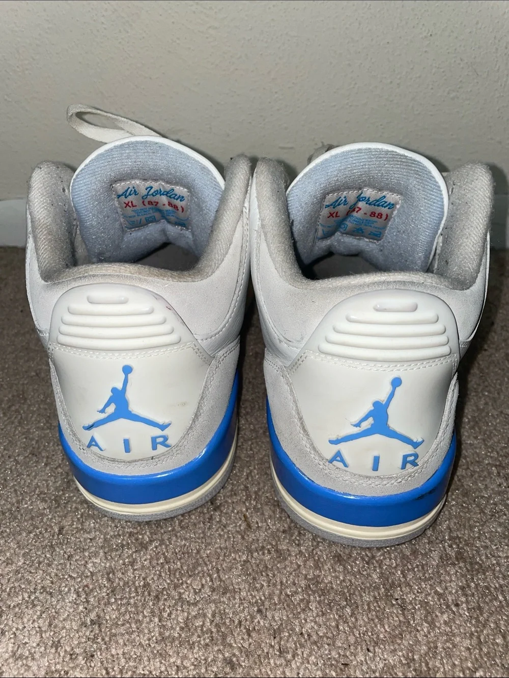 Jordan White Sneakers with Light Blue Accents
